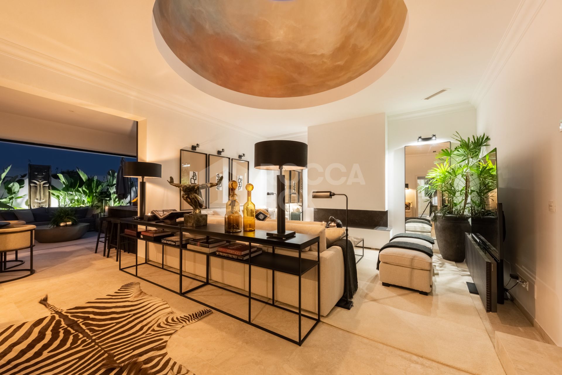 Scandi-style design bungalow in the beachfront Oasis Club on Marbella's Golden Mile.