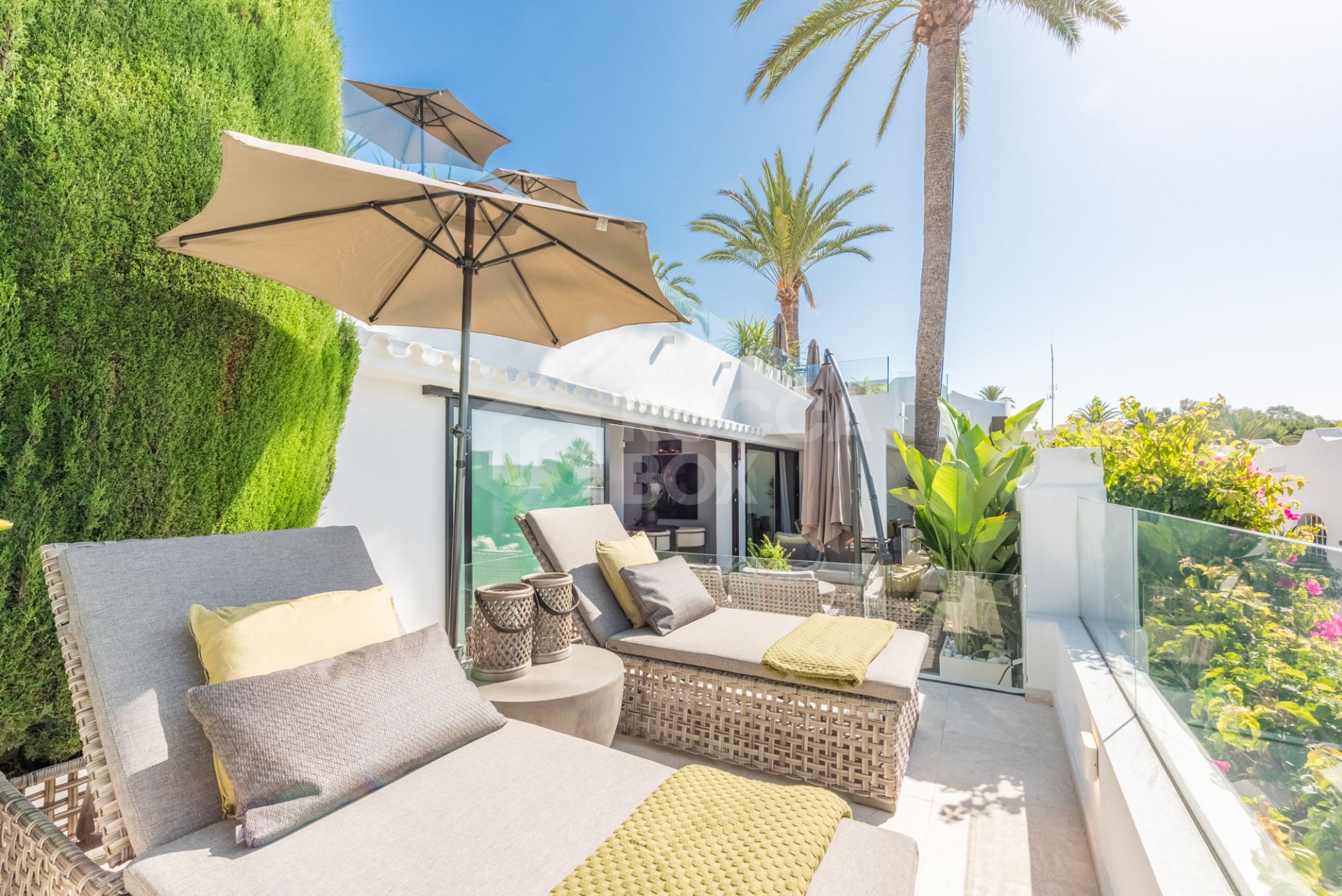 Scandi-style design bungalow in the beachfront Oasis Club on Marbella's Golden Mile.