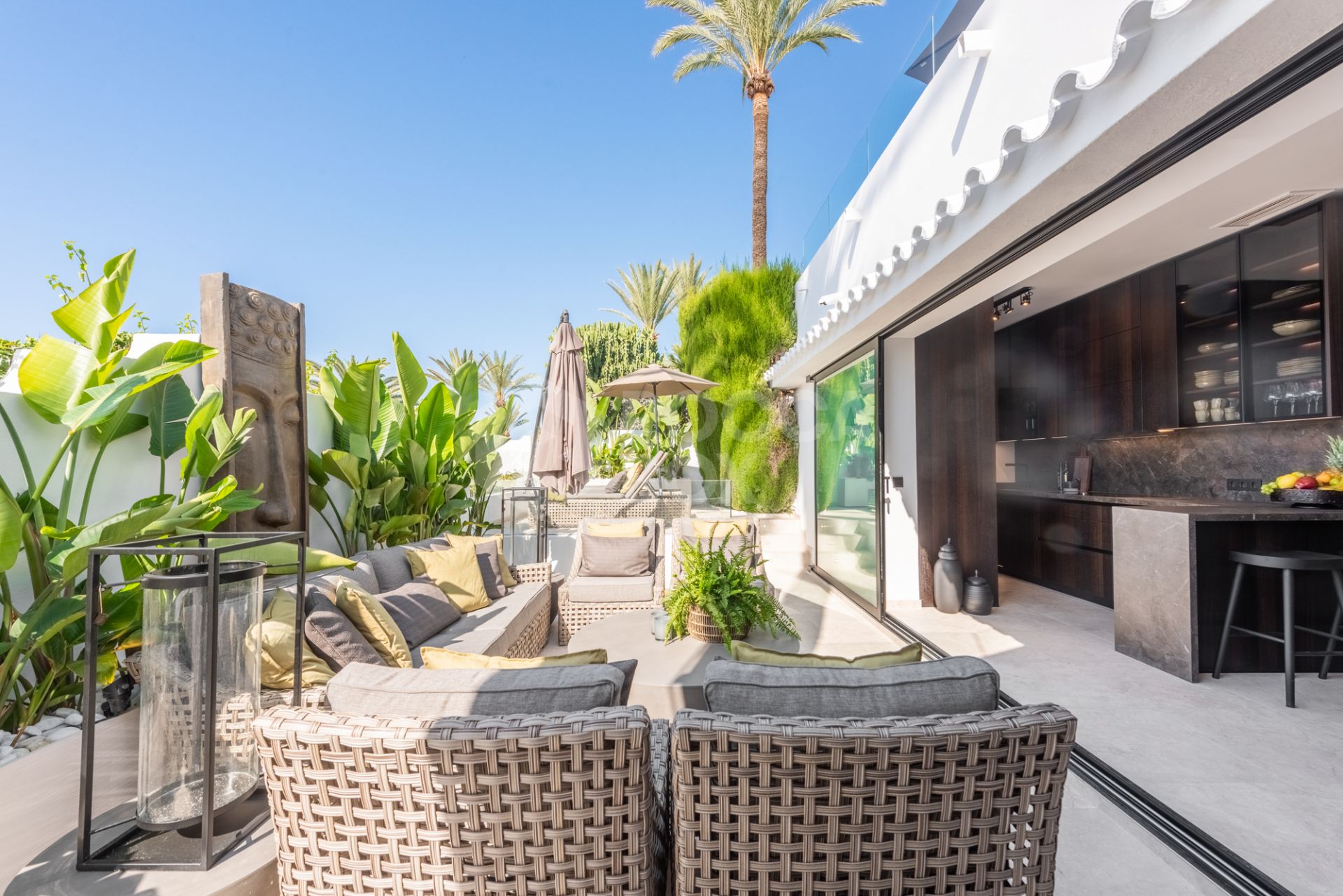 Scandi-style design bungalow in the beachfront Oasis Club on Marbella's Golden Mile.