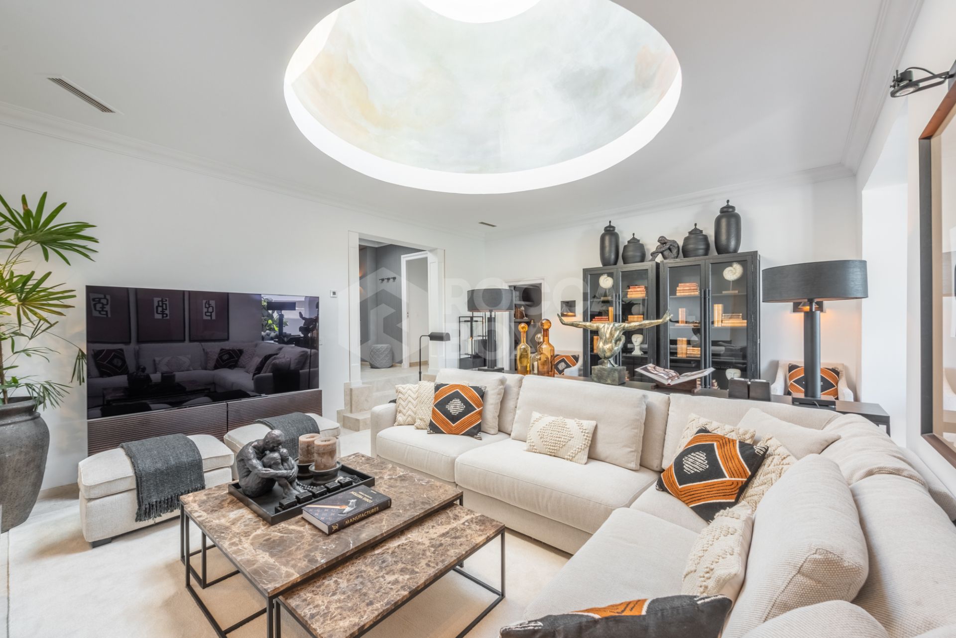 Scandi-style design bungalow in the beachfront Oasis Club on Marbella's Golden Mile.