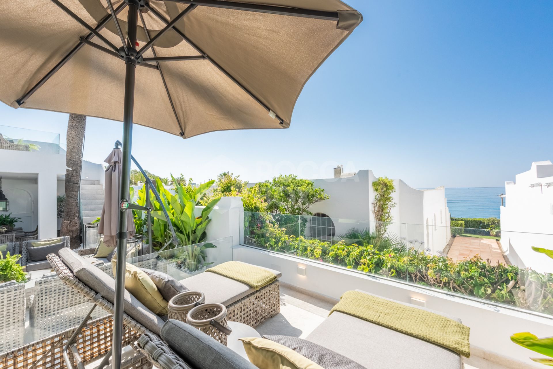 Scandi-style design bungalow in the beachfront Oasis Club on Marbella's Golden Mile.