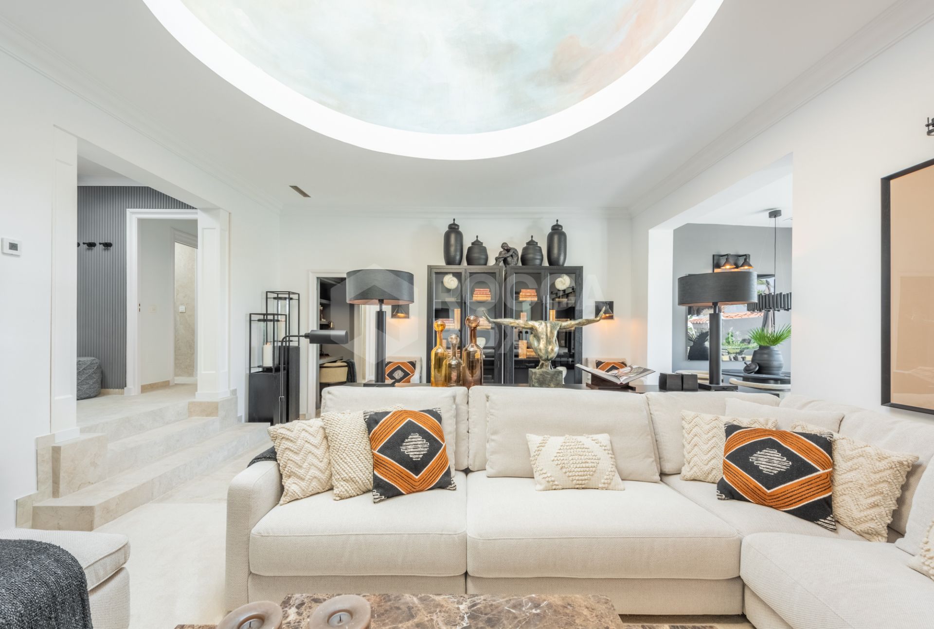 Scandi-style design bungalow in the beachfront Oasis Club on Marbella's Golden Mile.