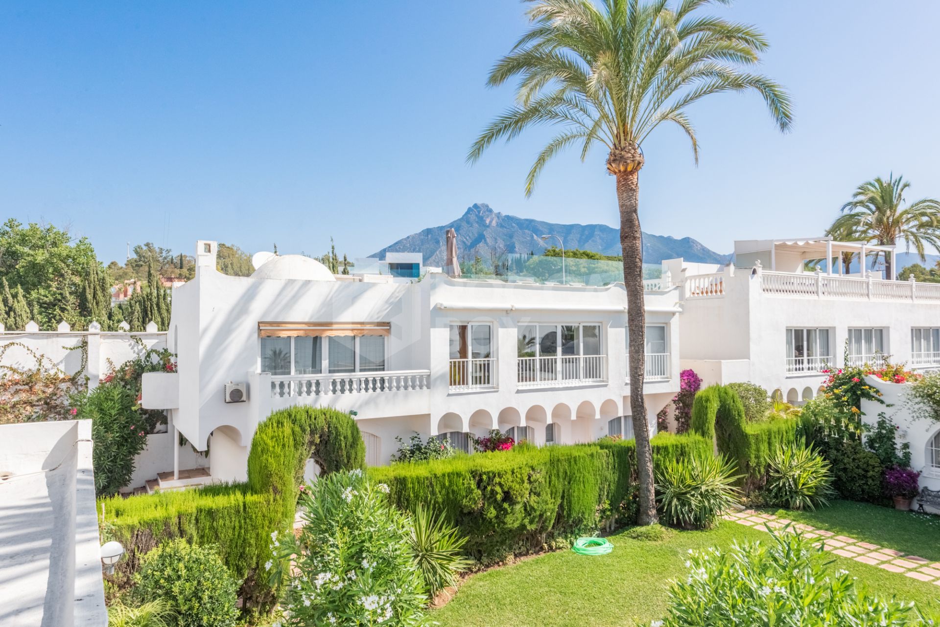 Scandi-style design bungalow in the beachfront Oasis Club on Marbella's Golden Mile.