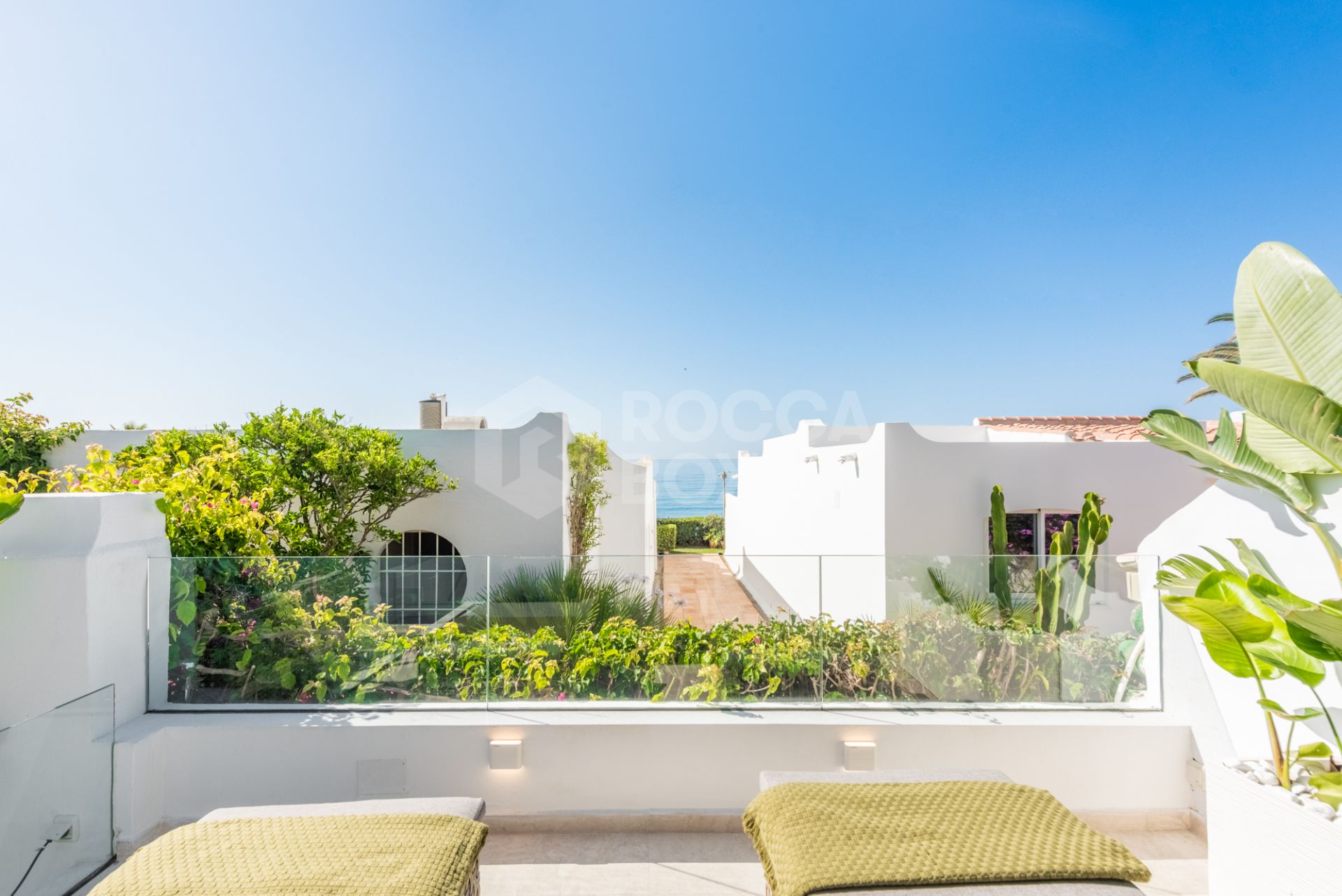 Scandi-style design bungalow in the beachfront Oasis Club on Marbella's Golden Mile.