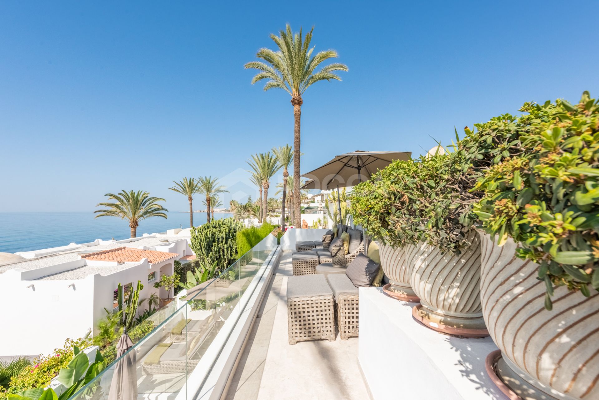 Scandi-style design bungalow in the beachfront Oasis Club on Marbella's Golden Mile.