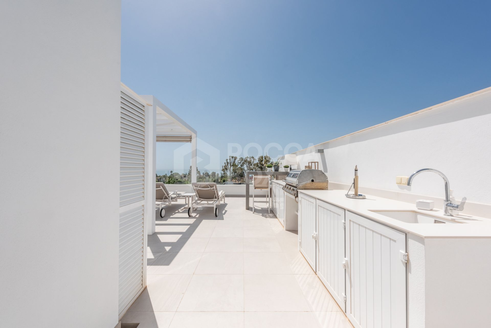 Stunning penthouse with fabulous terraces, sea views and elegant design. Walking distance to all amenities and the beach!