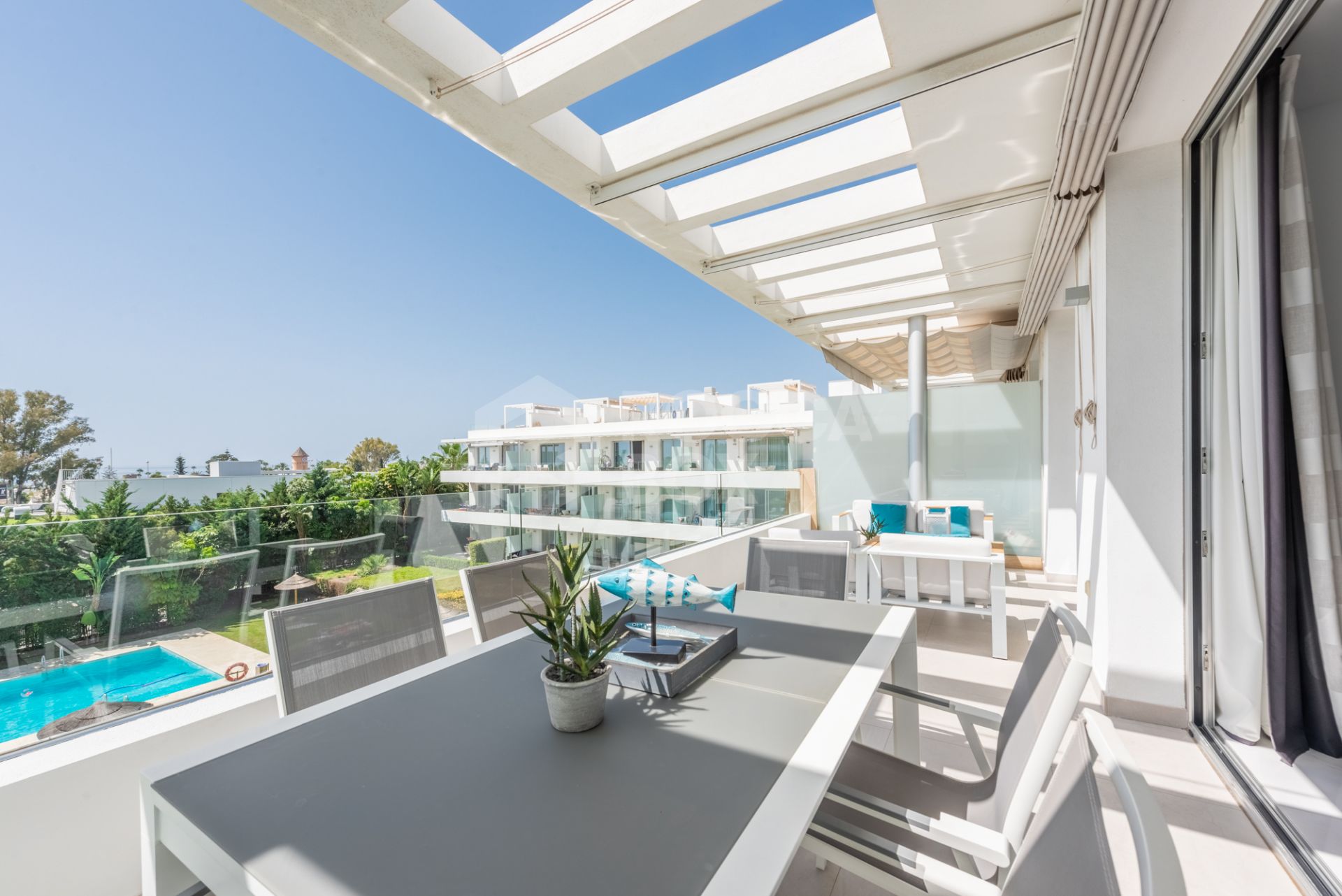 Stunning penthouse with fabulous terraces, sea views and elegant design. Walking distance to all amenities and the beach!