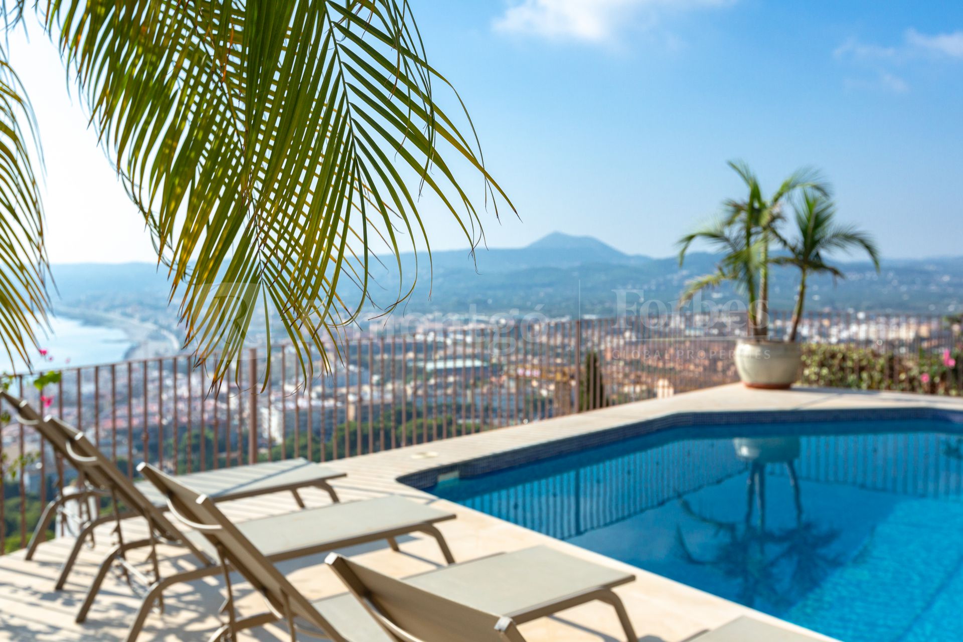 Bright Spanish elegant villa setting overlooking the Bay of Javea