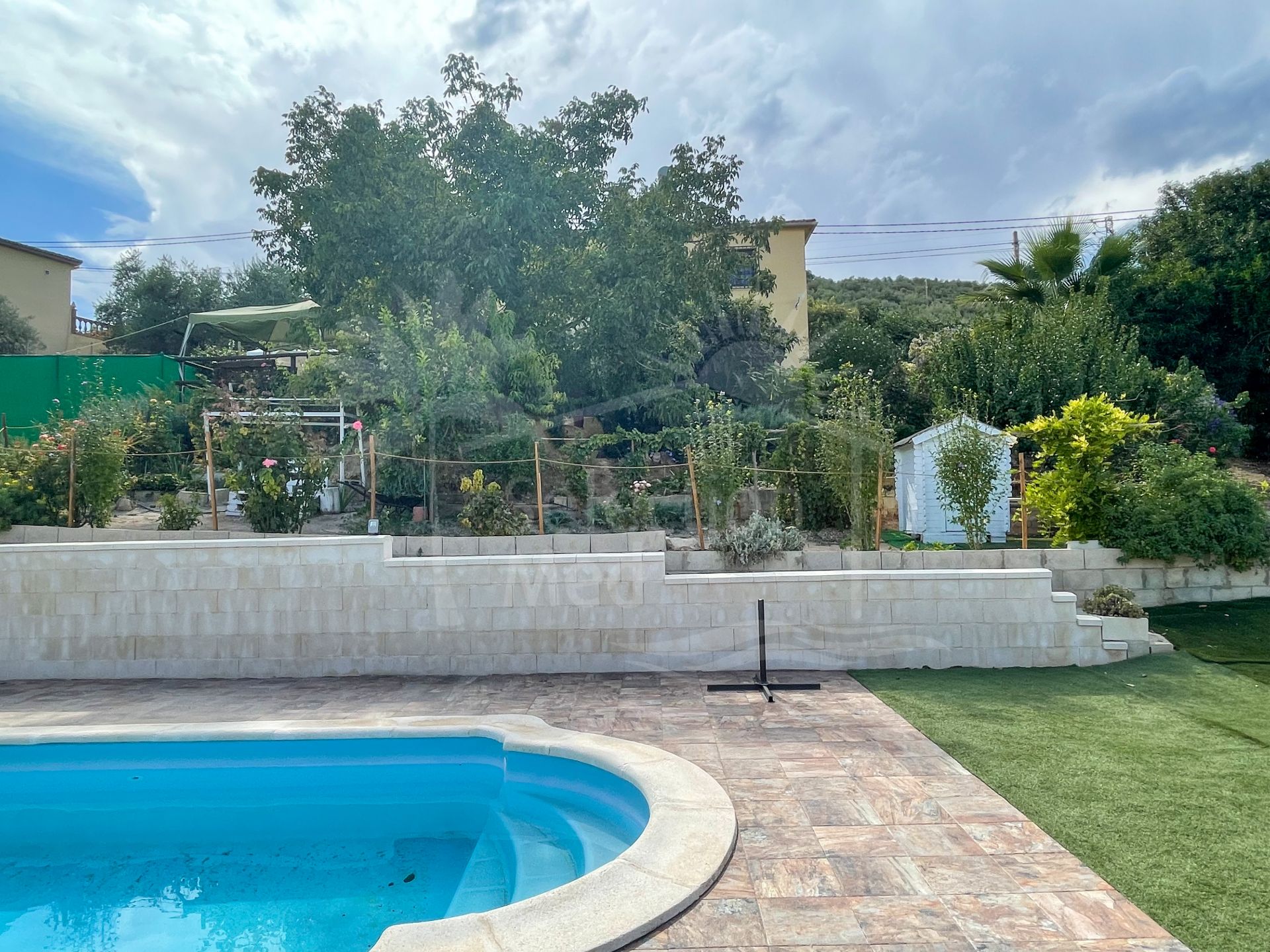 Lovely townhouse with beautiful garden, pool and views