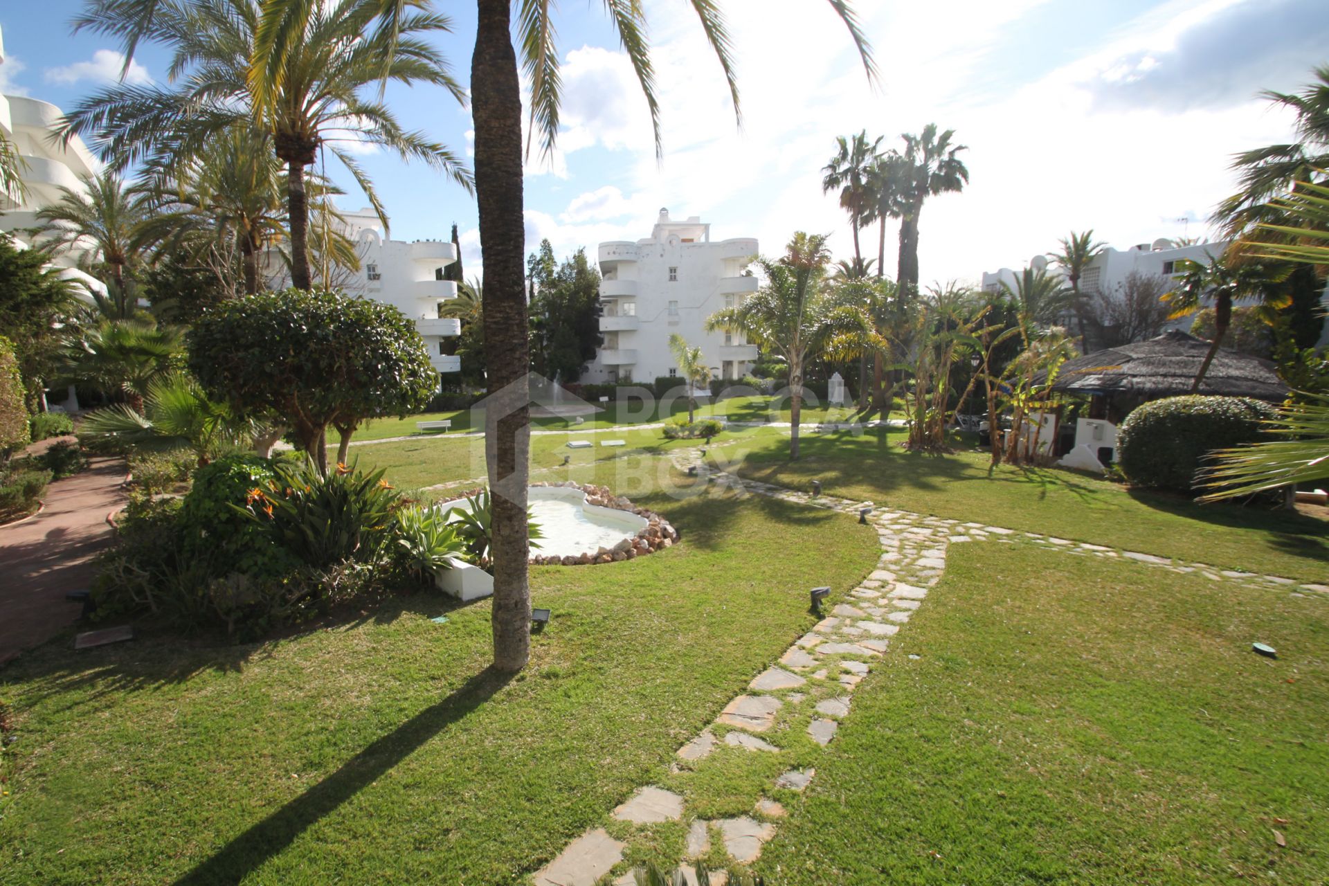 Fully renovated two bedroom, ground floor apartment in the well-known and gated community Marbella Real