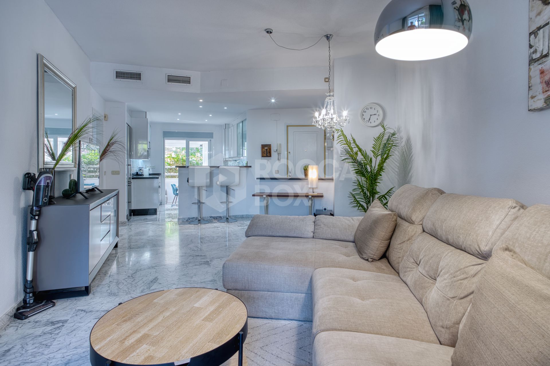 Fully renovated two bedroom, ground floor apartment in the well-known and gated community Marbella Real