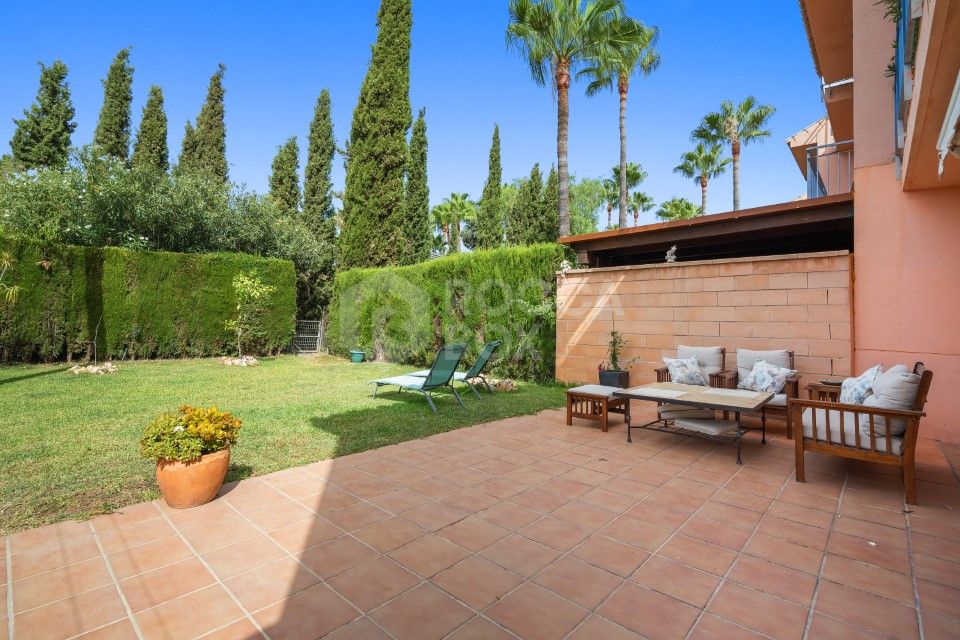 Bright and spacious, five bedroom townhouse located in Sun Golf, Nueva Andalucia with private garden