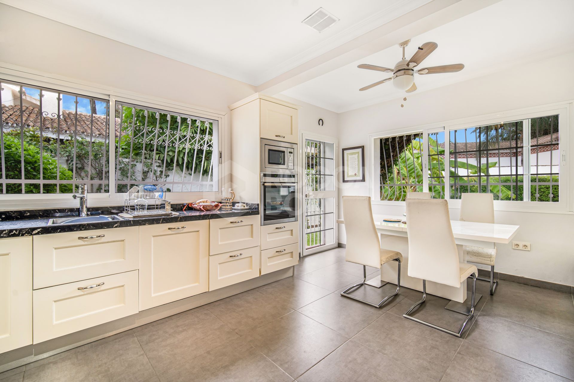 Charming four bedroom, southeast facing villa located in Guadalmina Alta with private pool and garden