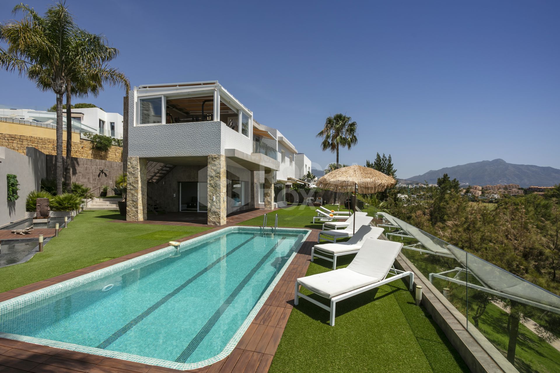 Stunning four bedroom, south facing frontline golf villa for sale in Nueva Atalaya, Benahavis, with stunning panoramic views to the sea