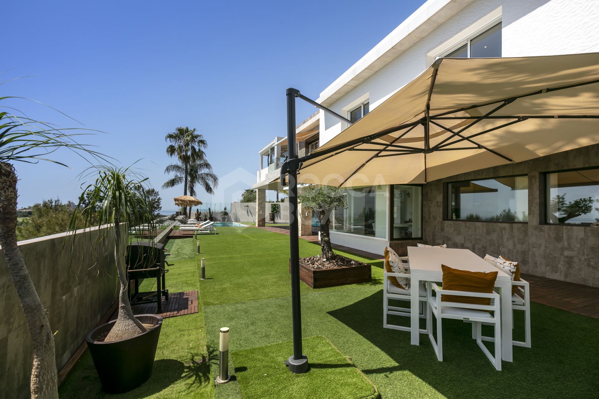 Stunning four bedroom, south facing frontline golf villa for sale in Nueva Atalaya, Benahavis, with stunning panoramic views to the sea