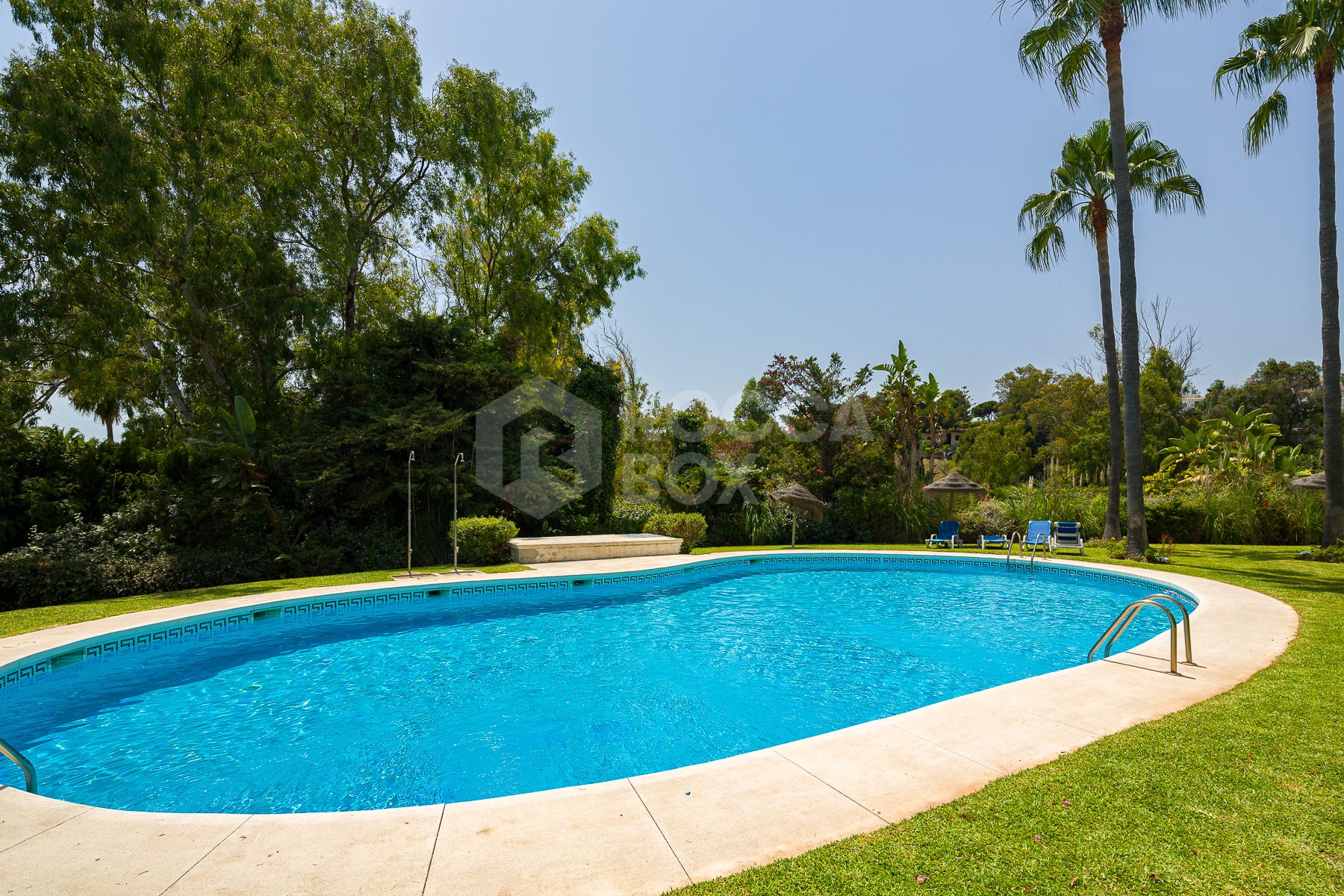 Stunning two bedroom south west facing elevated ground floor apartment in the heart of Marbella's Golden Mile