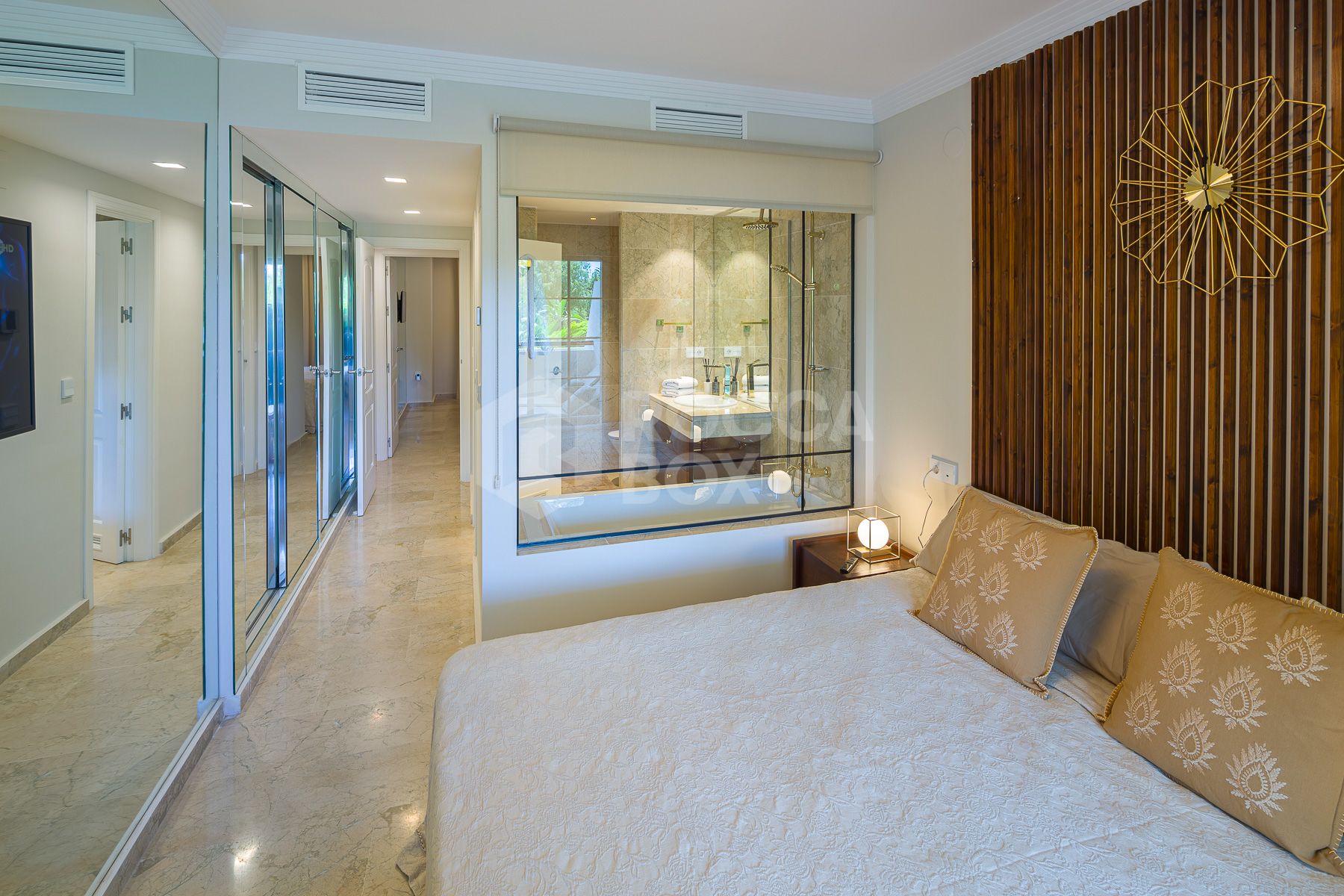 Stunning two bedroom south west facing elevated ground floor apartment in the heart of Marbella's Golden Mile