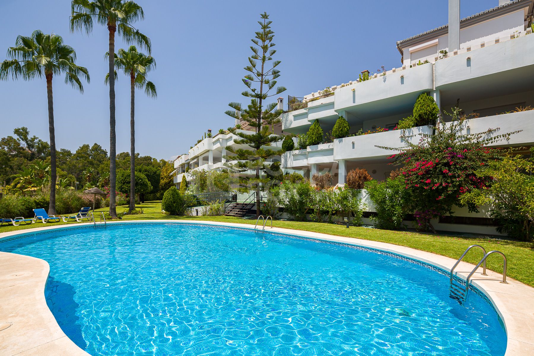 Stunning two bedroom south west facing elevated ground floor apartment in the heart of Marbella's Golden Mile