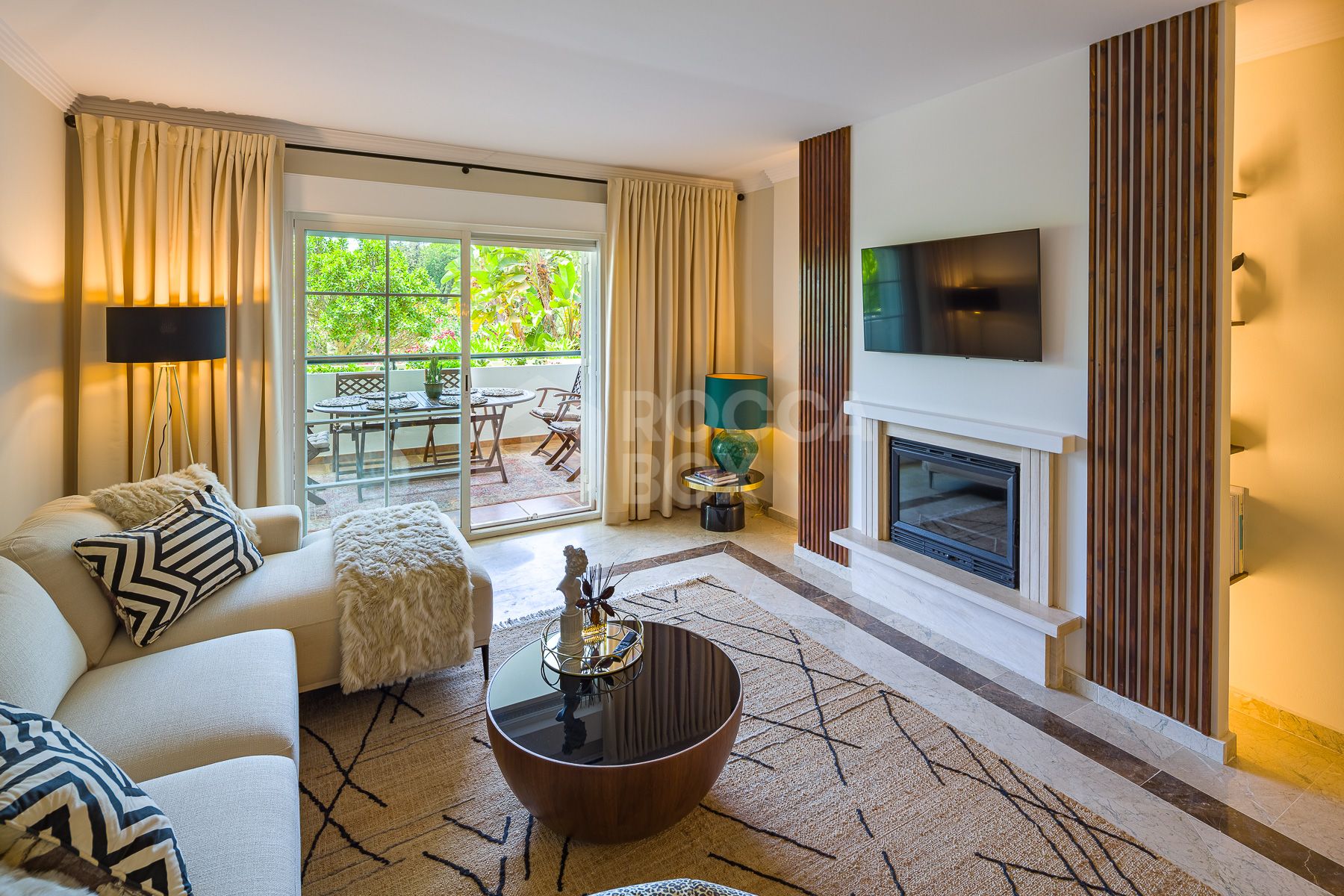 Stunning two bedroom south west facing elevated ground floor apartment in the heart of Marbella's Golden Mile