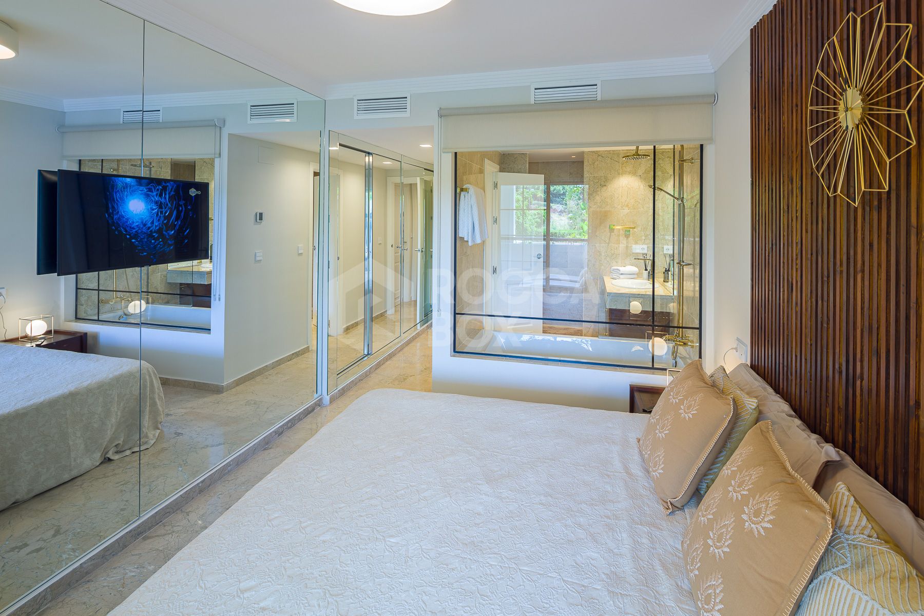 Stunning two bedroom south west facing elevated ground floor apartment in the heart of Marbella's Golden Mile
