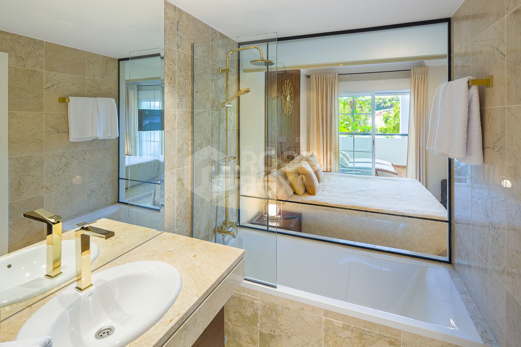 Stunning two bedroom south west facing elevated ground floor apartment in the heart of Marbella's Golden Mile