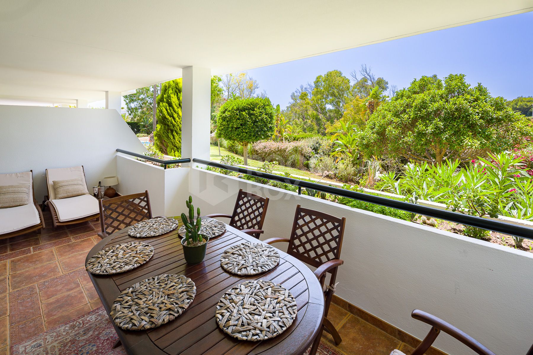 Stunning two bedroom south west facing elevated ground floor apartment in the heart of Marbella's Golden Mile