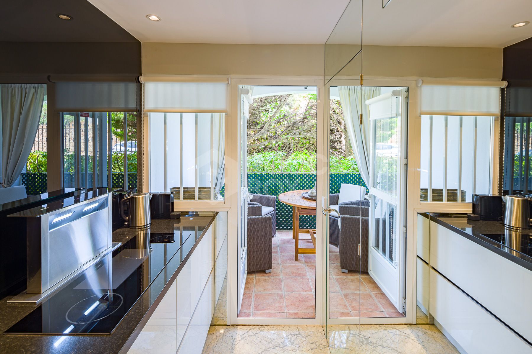 Stunning two bedroom south west facing elevated ground floor apartment in the heart of Marbella's Golden Mile