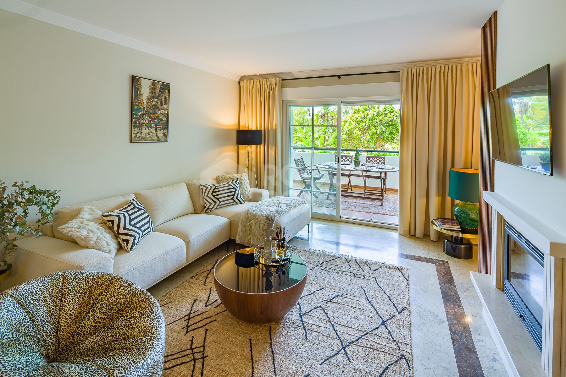 Stunning two bedroom south west facing elevated ground floor apartment in the heart of Marbella's Golden Mile