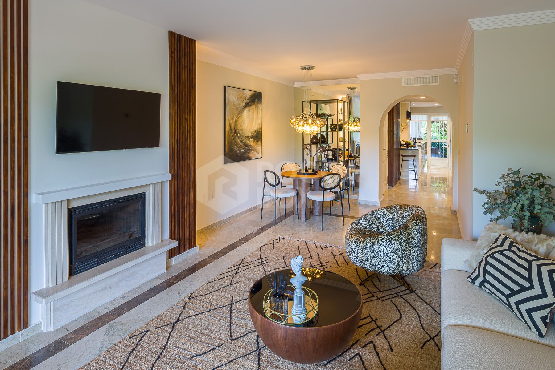 Stunning two bedroom south west facing elevated ground floor apartment in the heart of Marbella's Golden Mile