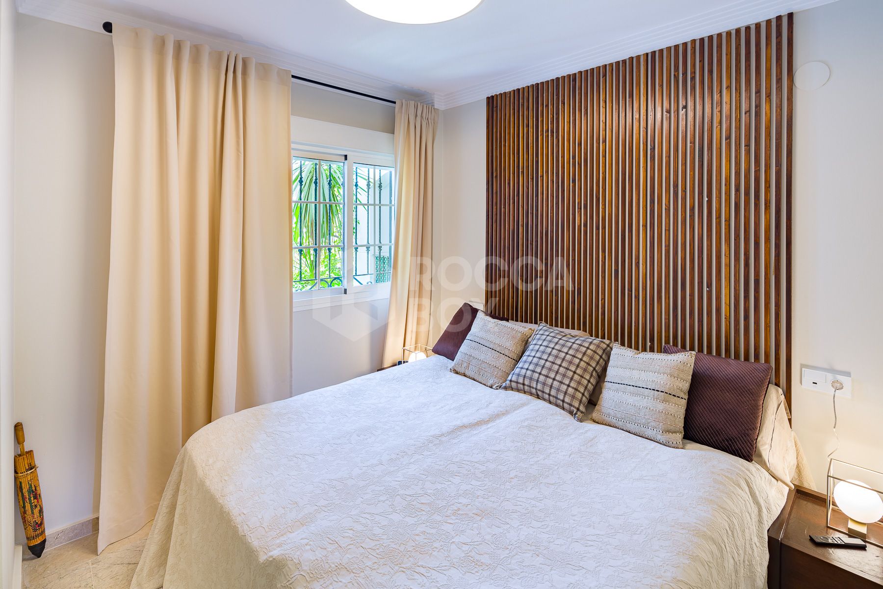 Stunning two bedroom south west facing elevated ground floor apartment in the heart of Marbella's Golden Mile