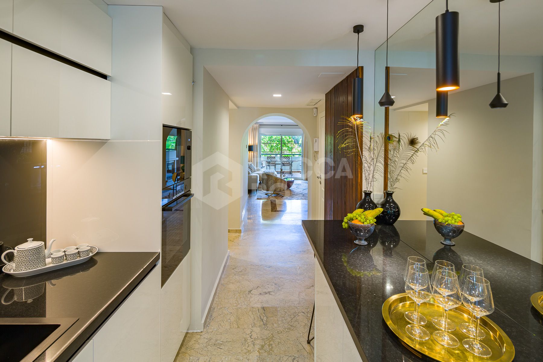 Stunning two bedroom south west facing elevated ground floor apartment in the heart of Marbella's Golden Mile
