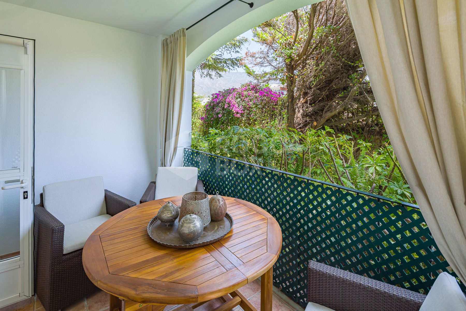 Stunning two bedroom south west facing elevated ground floor apartment in the heart of Marbella's Golden Mile