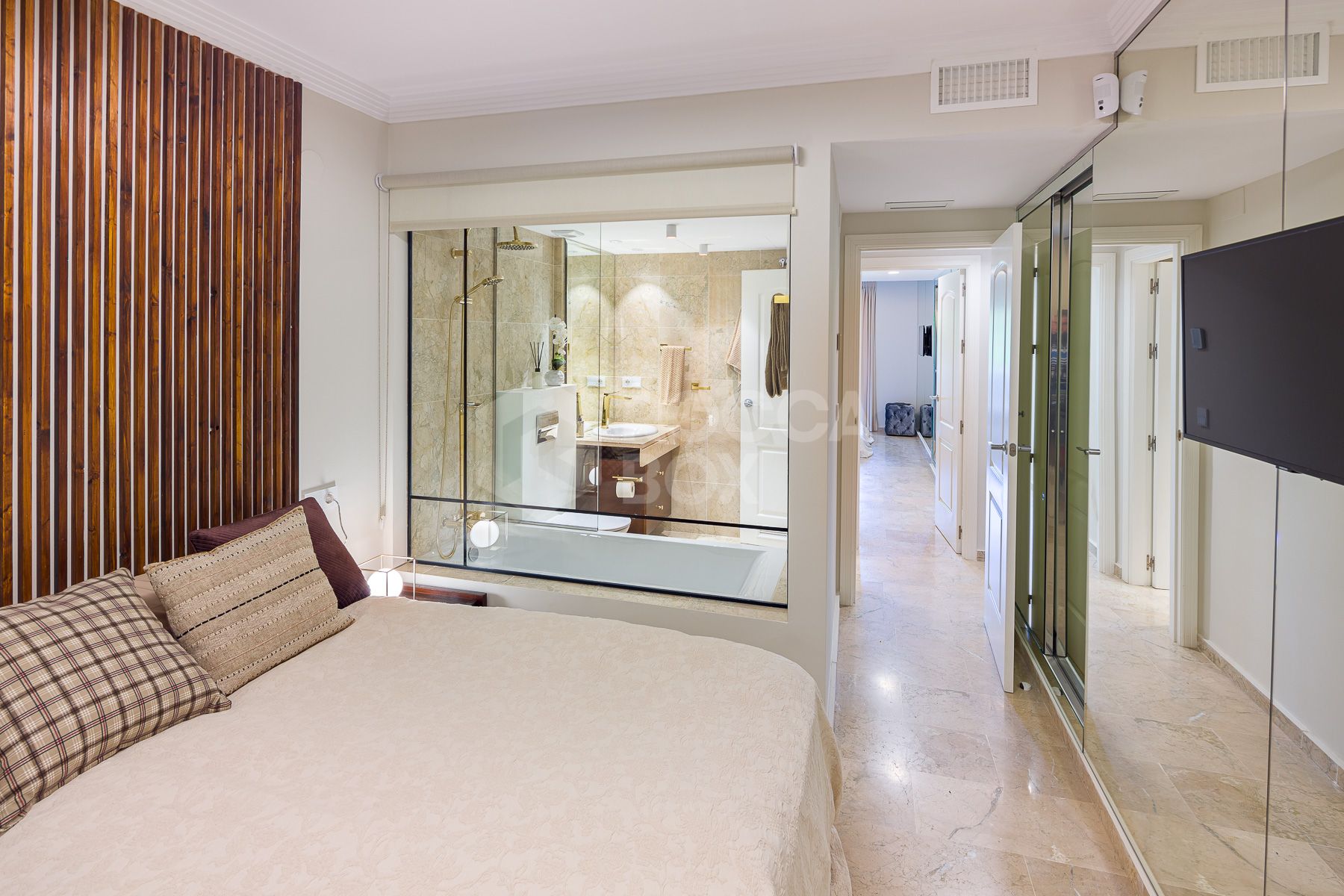 Stunning two bedroom south west facing elevated ground floor apartment in the heart of Marbella's Golden Mile