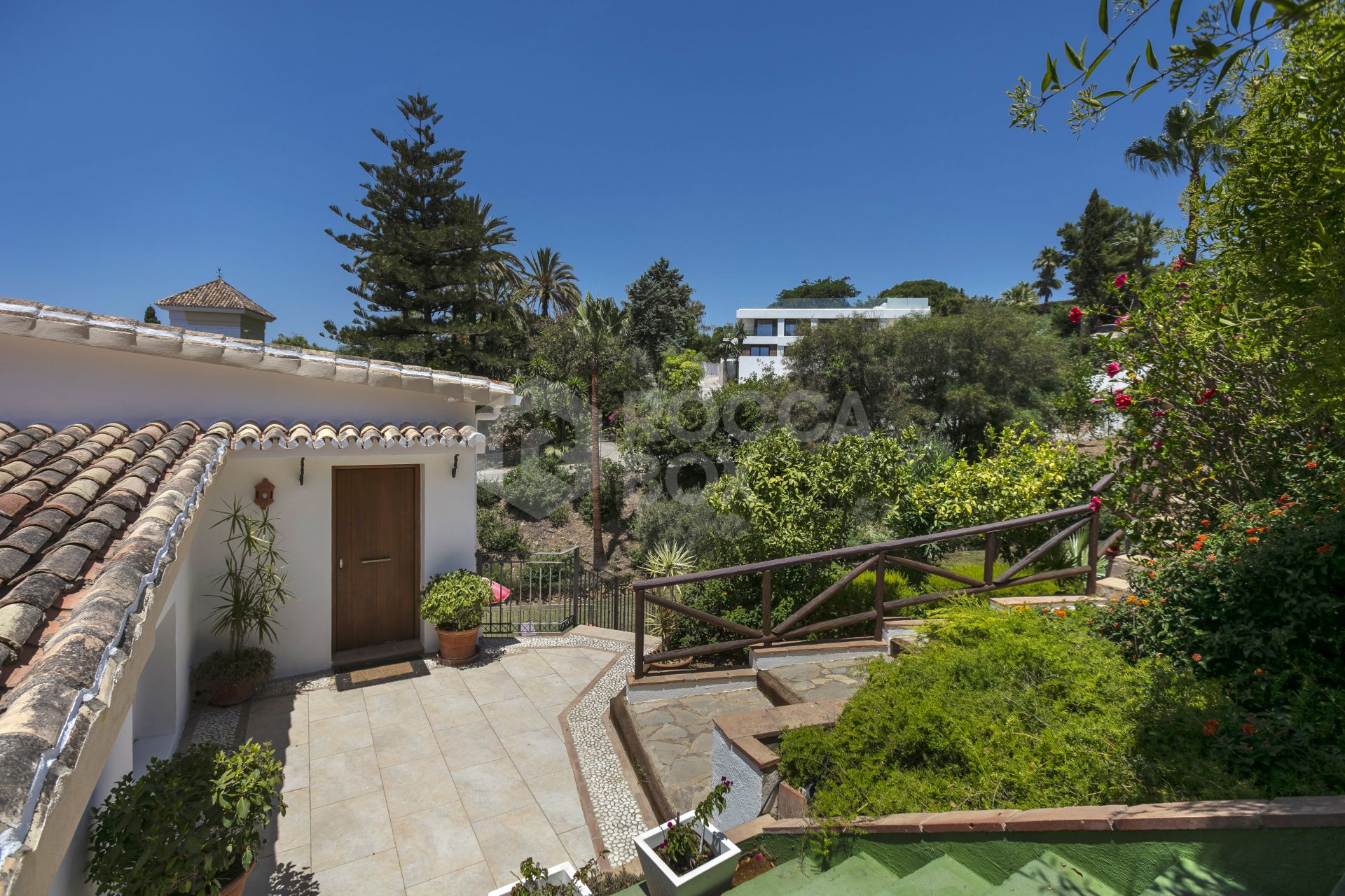 Fantastic four bedroom south west facing villa, located in a very quiet street with very good views to the sea and mountains, in El Rosario, Marbella.