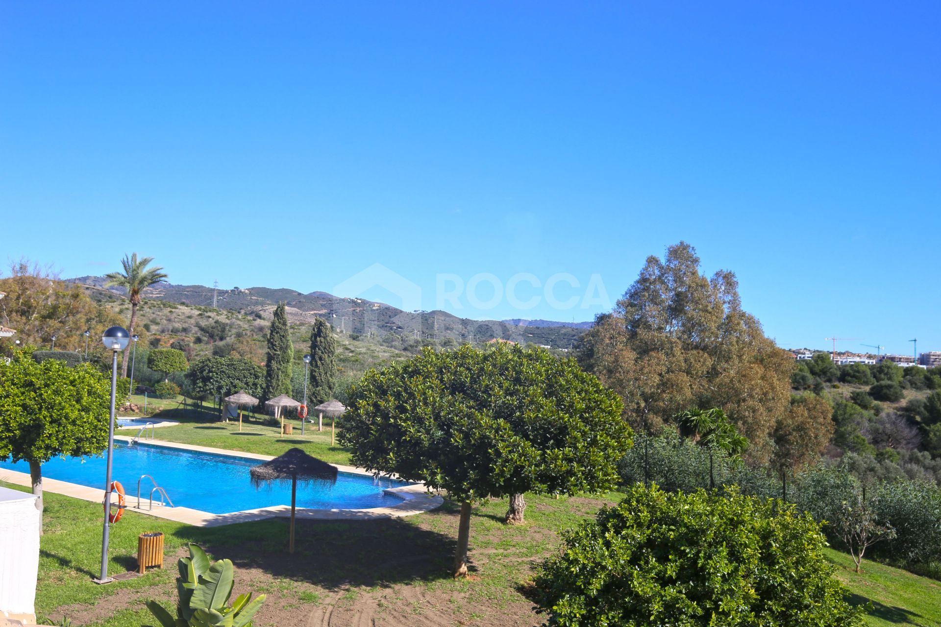 Charming one bedroom, southeast facing apartment in the gated community of Río Real