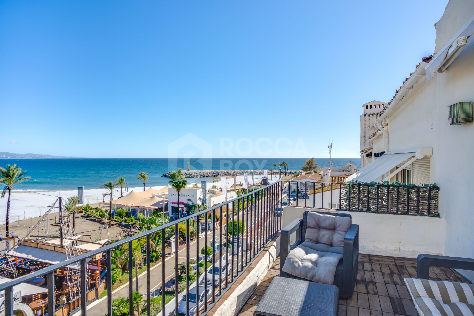 Beautiful beachfront penthouse with sea and mountain views, located in the heart of Puerto Banús.