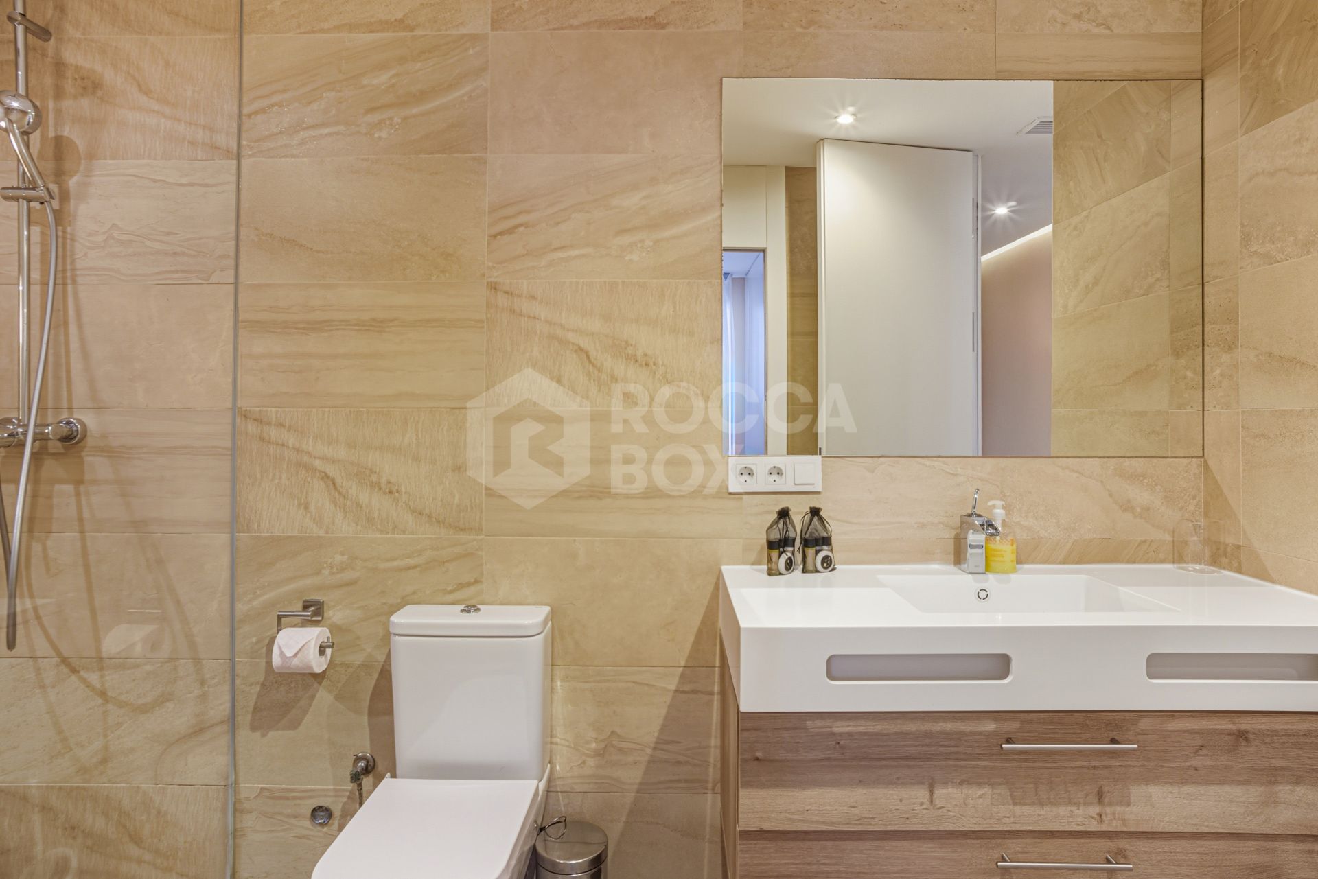 Two-bedroom, beachfront apartment with sea and mountain views, located in the heart of Puerto Banús.