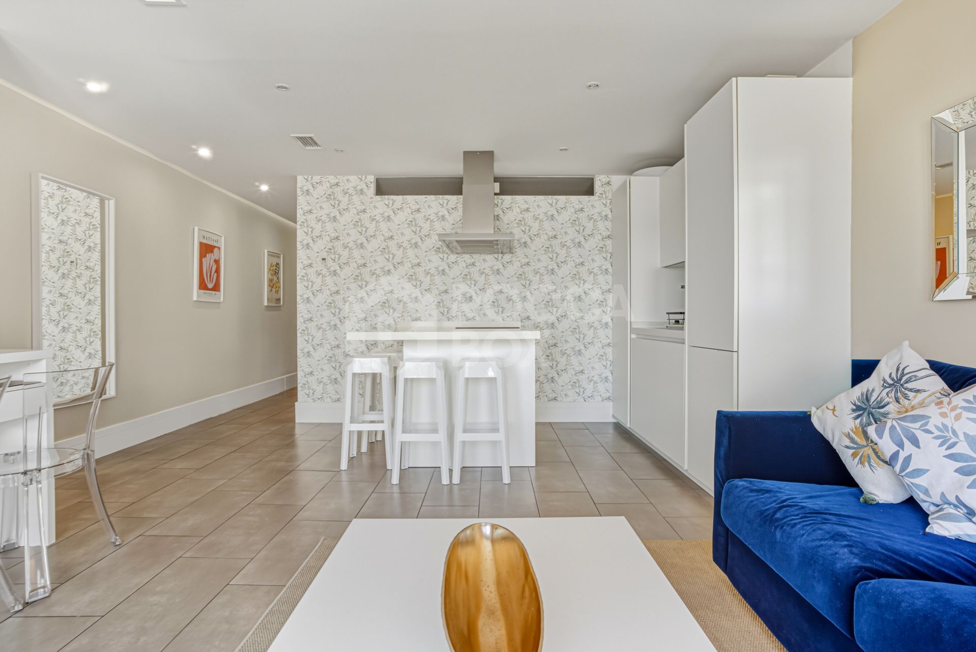 Two-bedroom, beachfront apartment with sea and mountain views, located in the heart of Puerto Banús.