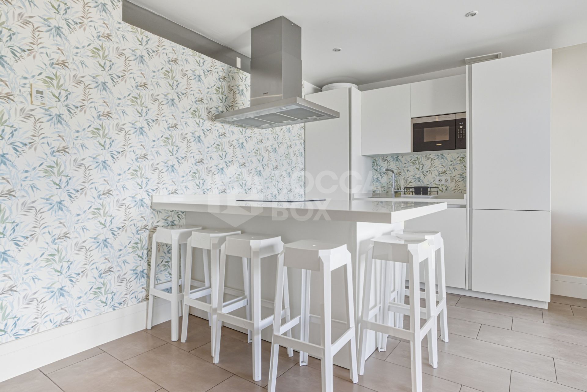 Two-bedroom, beachfront apartment with sea and mountain views, located in the heart of Puerto Banús.