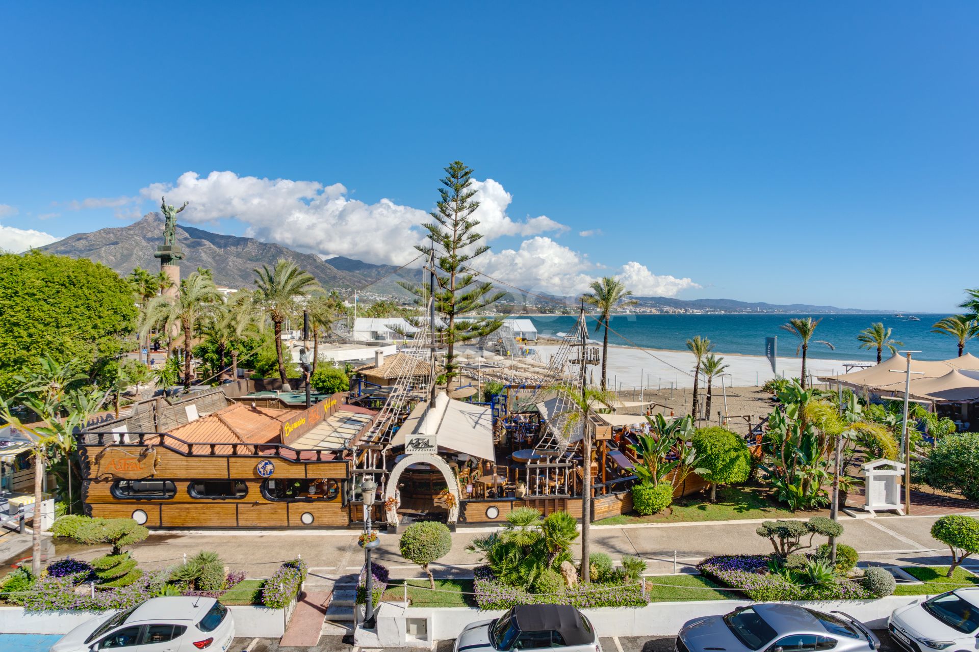 Two-bedroom, beachfront apartment with sea and mountain views, located in the heart of Puerto Banús.