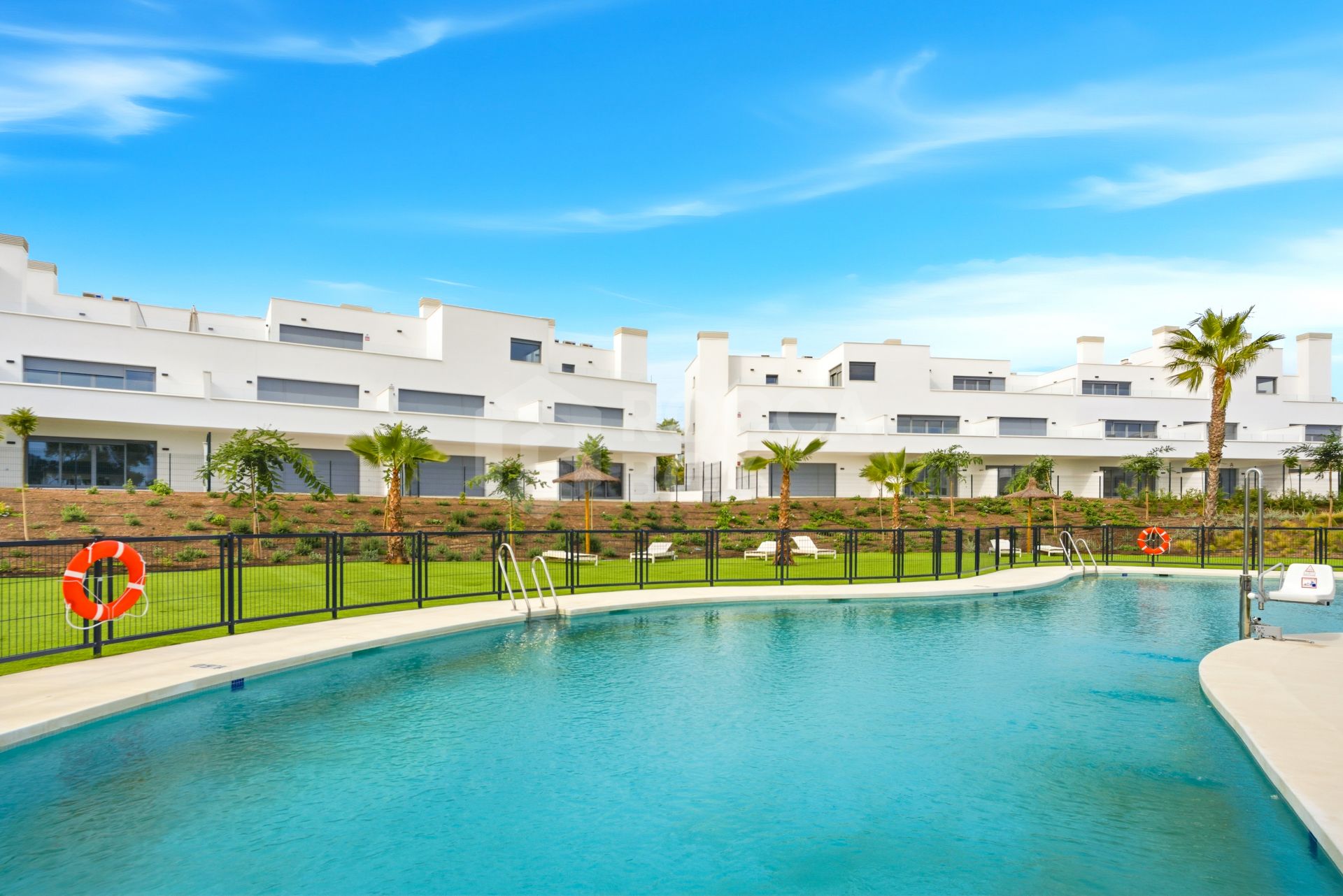 Stylish, southwest facing two bedroom apartment located in the sought-after gated community Acqua Gardens on the New Golden Mile, Estepona