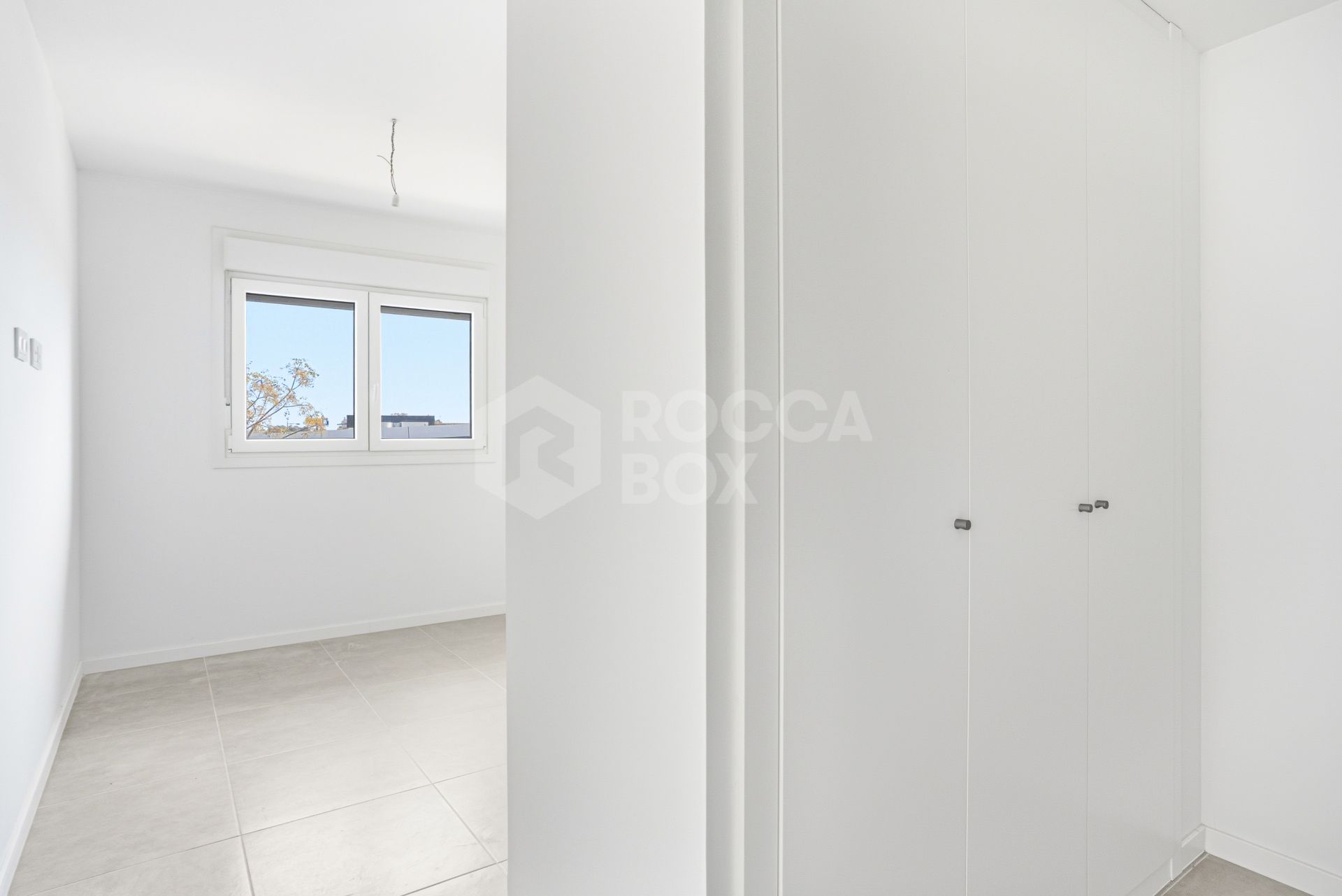 Stylish, southwest facing two bedroom apartment located in the sought-after gated community Acqua Gardens on the New Golden Mile, Estepona