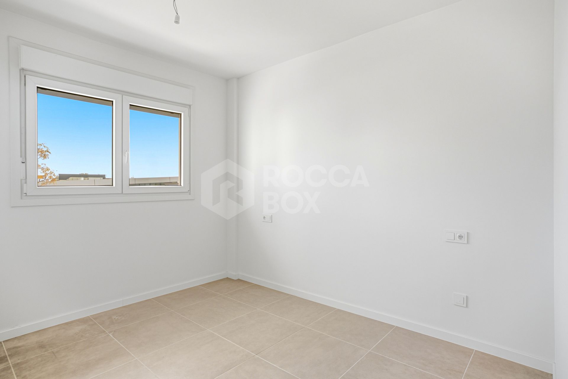 Stylish, southwest facing two bedroom apartment located in the sought-after gated community Acqua Gardens on the New Golden Mile, Estepona