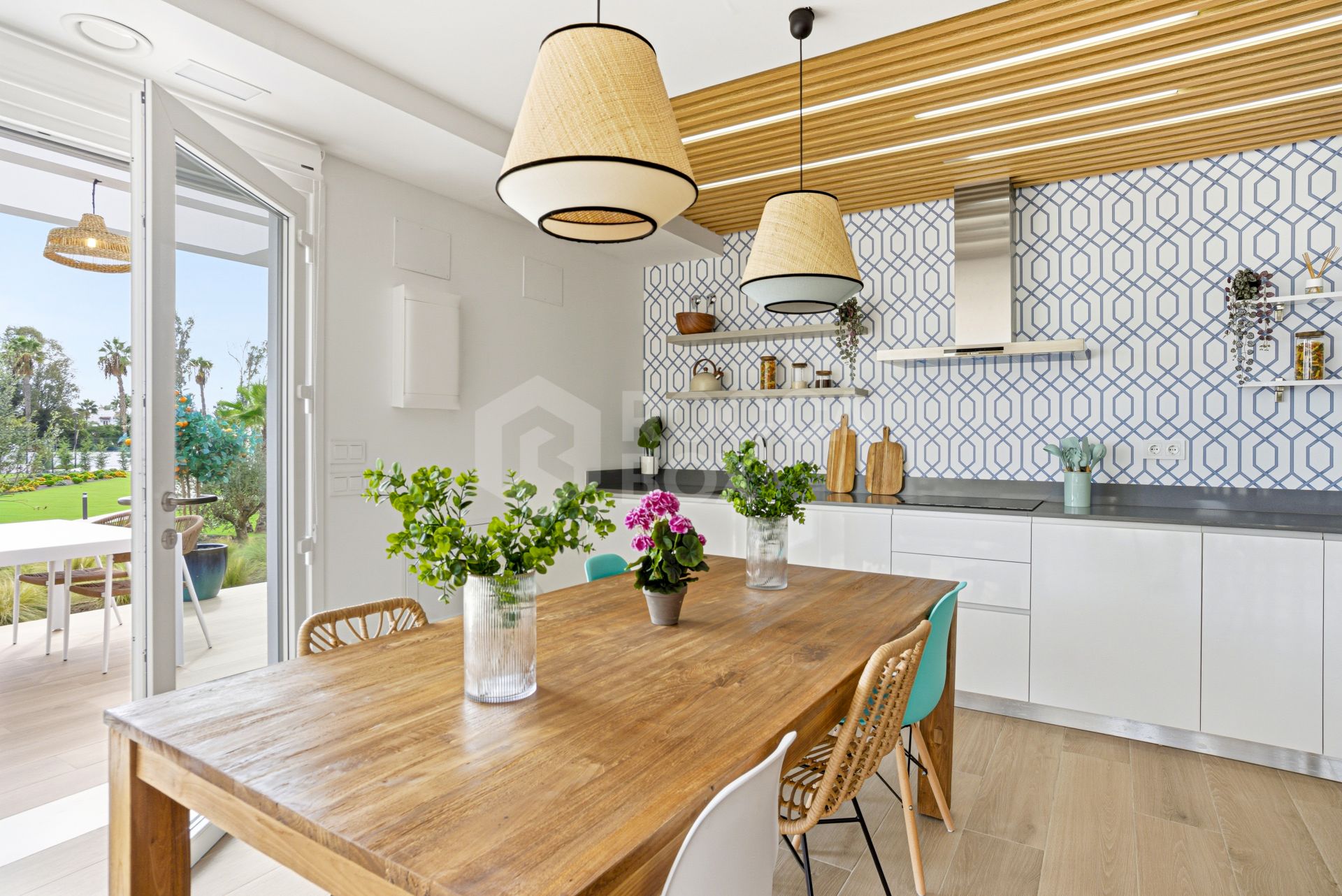 Stylish, southwest facing two bedroom apartment located in the sought-after gated community Acqua Gardens on the New Golden Mile, Estepona