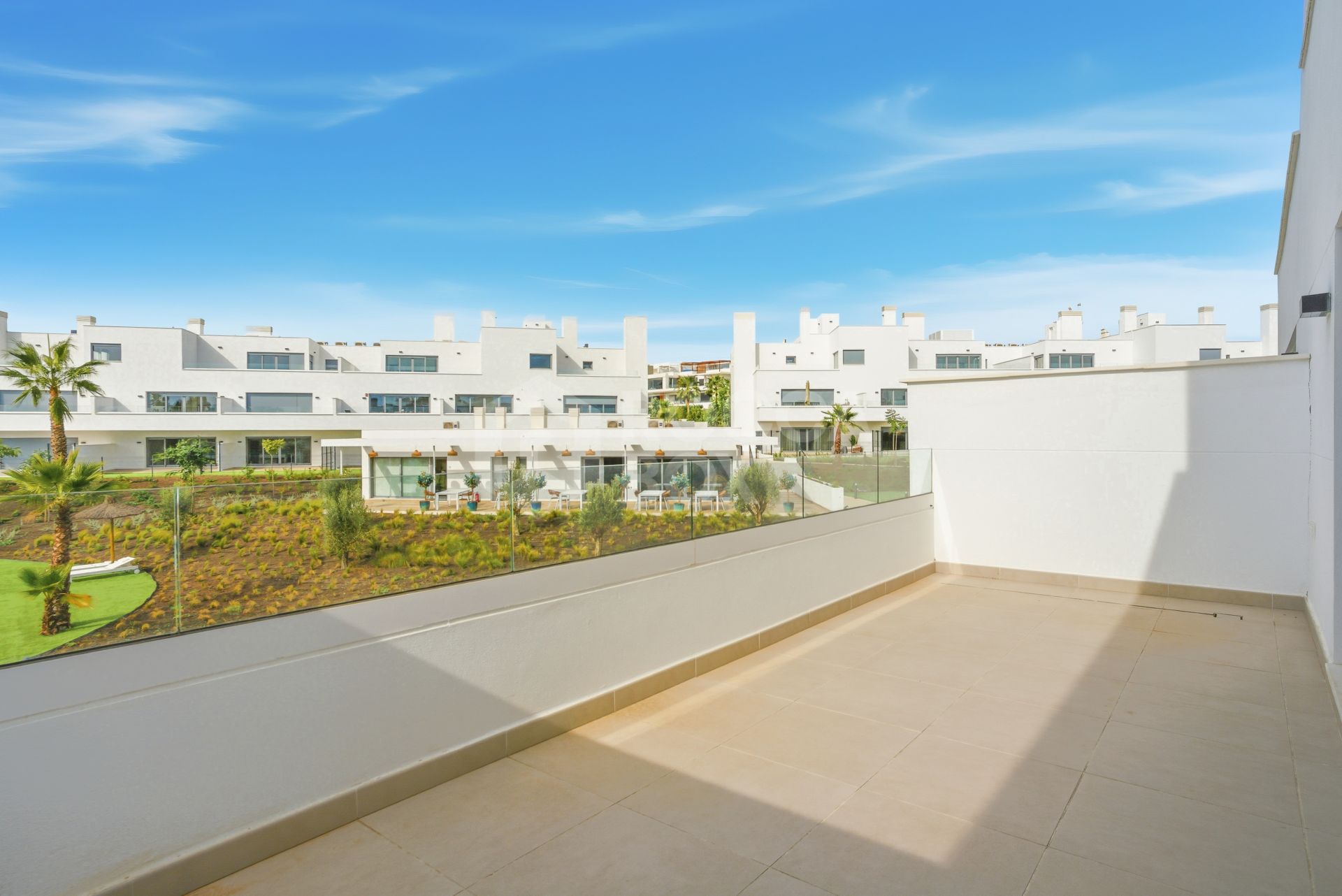 Stylish, southwest facing two bedroom apartment located in the sought-after gated community Acqua Gardens on the New Golden Mile, Estepona