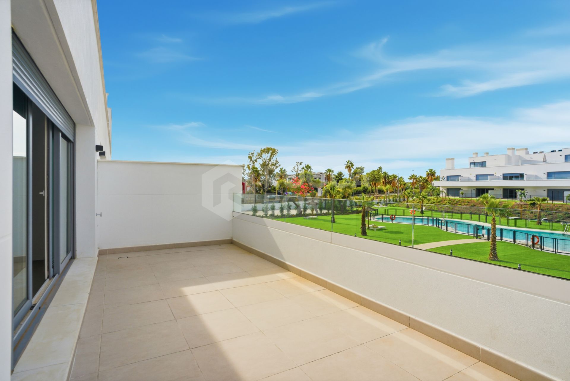 Stylish, southwest facing two bedroom apartment located in the sought-after gated community Acqua Gardens on the New Golden Mile, Estepona