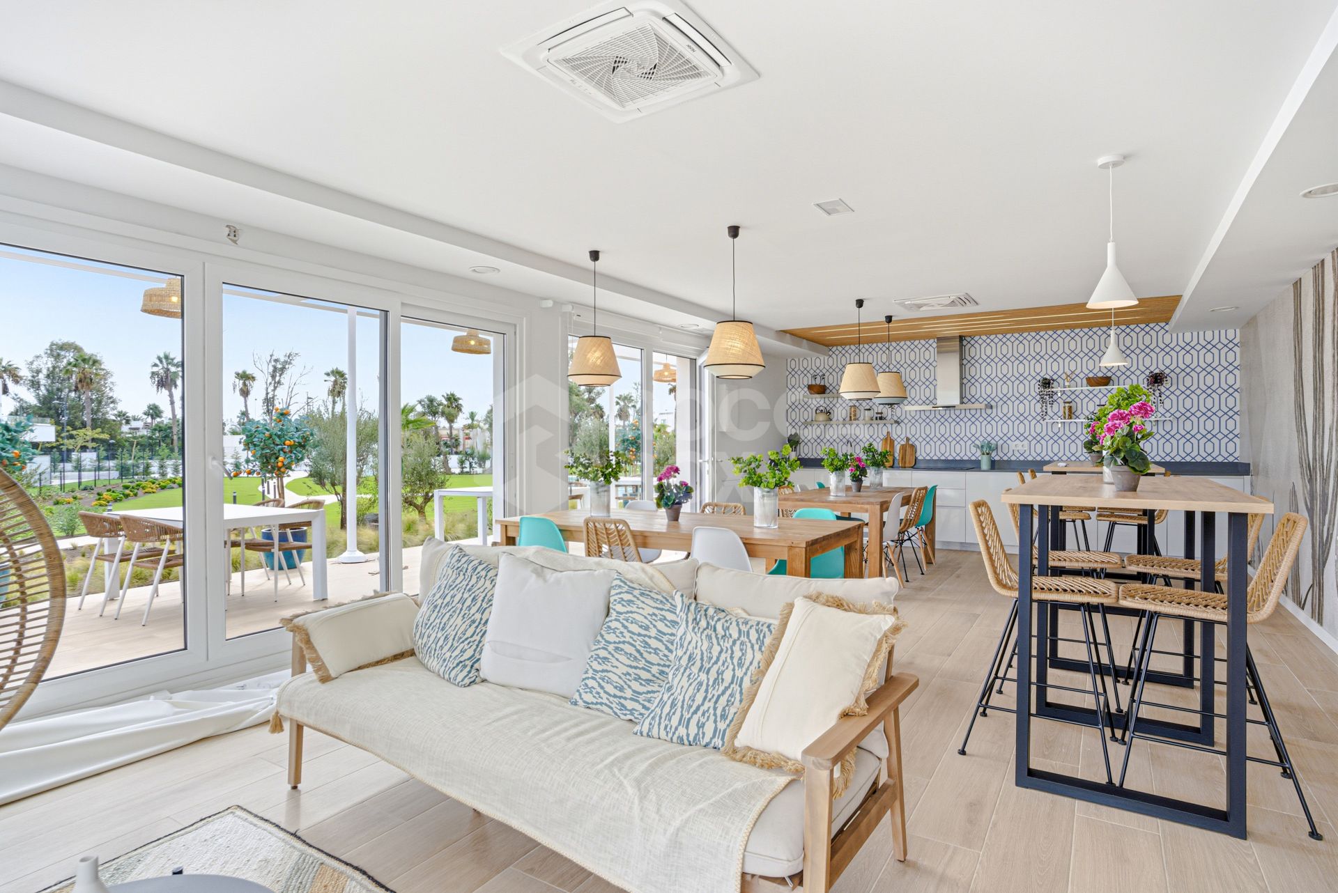 Stylish, southwest facing two bedroom apartment located in the sought-after gated community Acqua Gardens on the New Golden Mile, Estepona