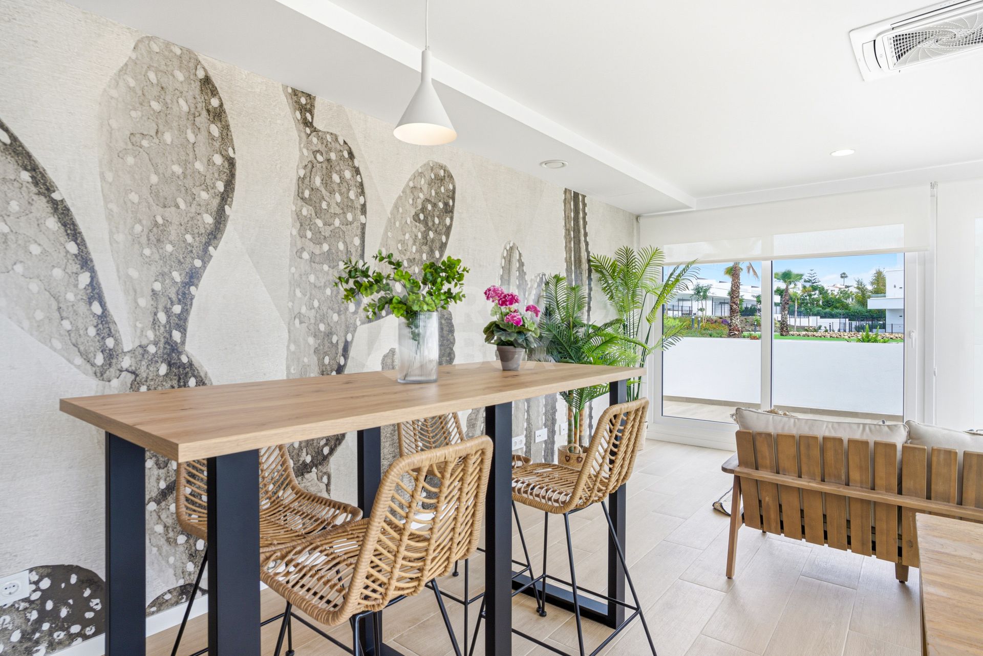 Stylish, southwest facing two bedroom apartment located in the sought-after gated community Acqua Gardens on the New Golden Mile, Estepona