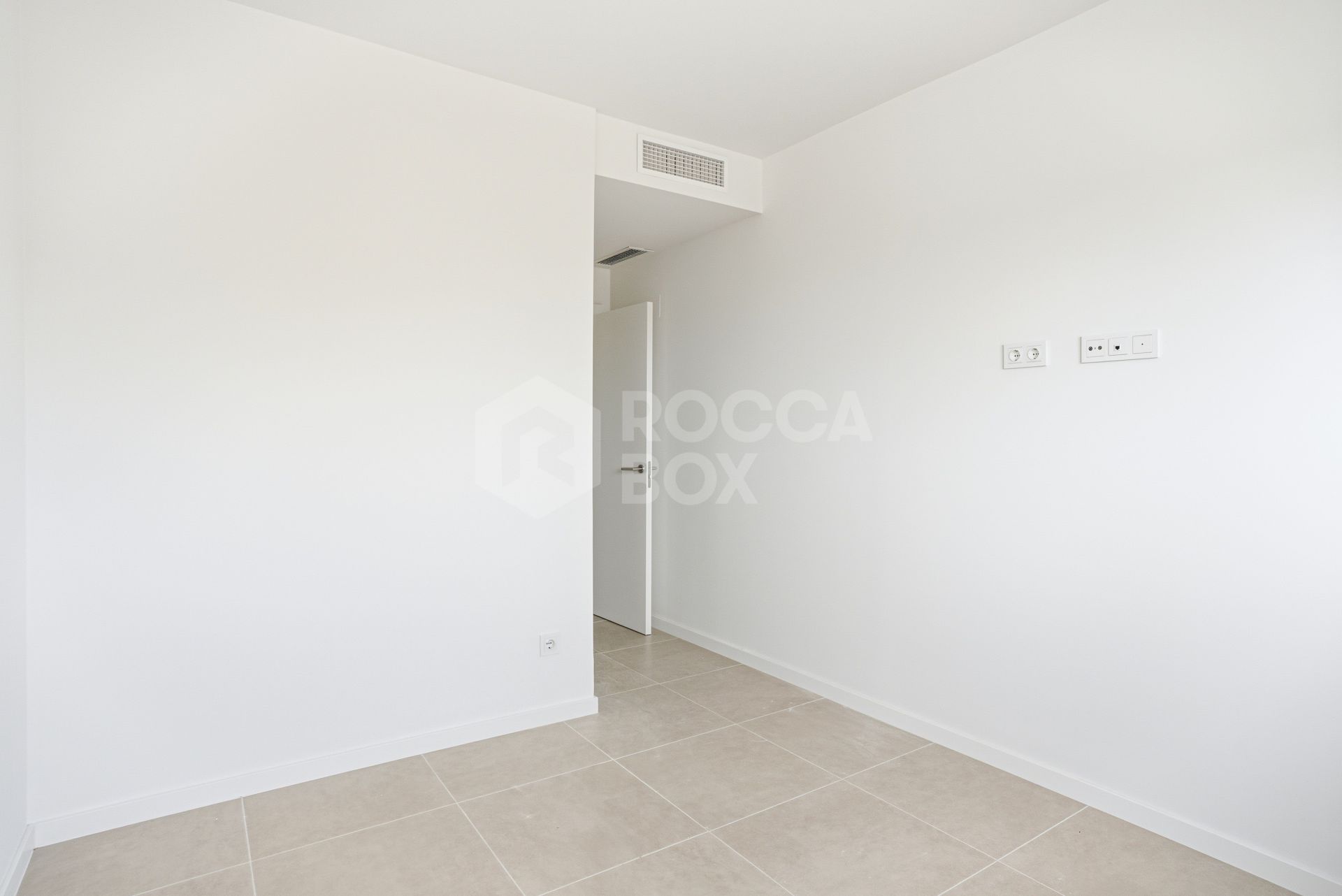 Stylish, southwest facing two bedroom apartment located in the sought-after gated community Acqua Gardens on the New Golden Mile, Estepona