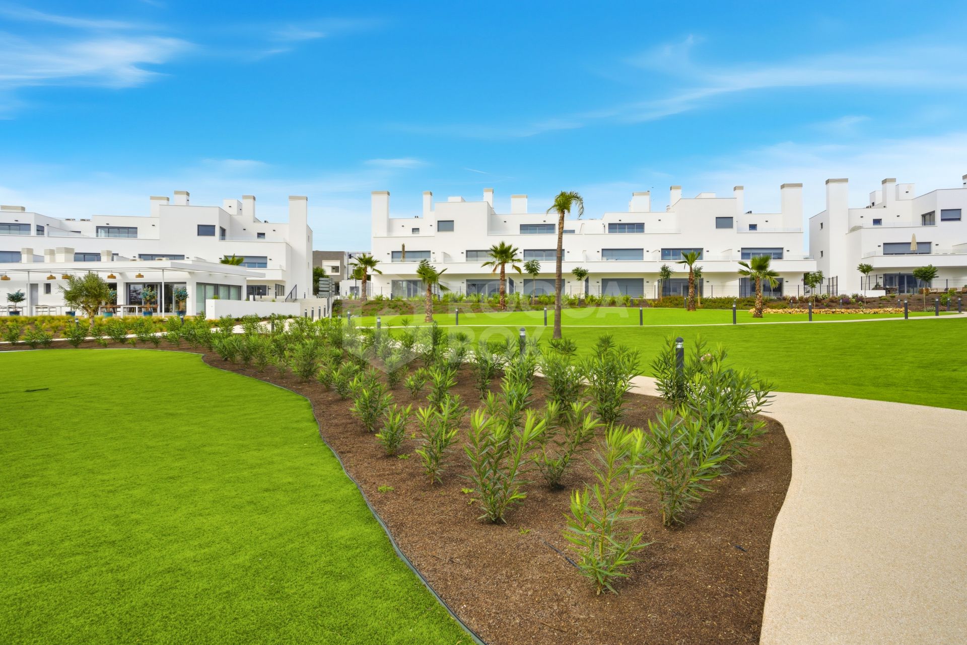 Stylish, southwest facing two bedroom apartment located in the sought-after gated community Acqua Gardens on the New Golden Mile, Estepona